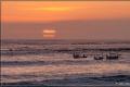 Pêcheurs au coucher de soleil